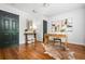 Bright office space with hardwood floors, neutral walls, and a uniquely designed wooden desk at 1233 Ashford Creek Ne Park, Atlanta, GA 30319