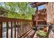 Small patio with privacy fence overlooks the street at 1233 Ashford Creek Ne Park, Atlanta, GA 30319