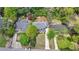 Overhead view of a charming house with mature green trees, manicured yard, and a double driveway at 1282 Fairhill Ne Ln, Atlanta, GA 30319
