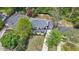 Aerial view of the property showcasing lush surroundings, manicured lawns, and the home's premium location at 1282 Fairhill Ne Ln, Atlanta, GA 30319