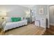 A quaint bedroom is equipped with a daybed and has an ensuite bathroom, perfect for a or a guest at 1282 Fairhill Ne Ln, Atlanta, GA 30319