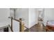 A hallway with wood floors leads to a room and features white and wood trim at 1282 Fairhill Ne Ln, Atlanta, GA 30319