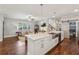 Open-concept kitchen with stainless steel appliances, an island, and a view of the living area at 1282 Fairhill Ne Ln, Atlanta, GA 30319