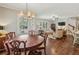 Open concept space with a dining area, living room, hardwood floors, and abundant natural light at 1282 Fairhill Ne Ln, Atlanta, GA 30319