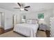 A spacious main bedroom has two windows and coordinating neutral decor at 1282 Fairhill Ne Ln, Atlanta, GA 30319