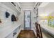 Well-organized mudroom features hooks, shelves, seating, and plenty of storage at 1282 Fairhill Ne Ln, Atlanta, GA 30319