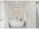 Elegant bathroom showcasing a freestanding tub and a view of the walk in shower at 1305 Old Woodbine Rd, Atlanta, GA 30319