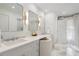 Bright bathroom with double vanity, marble floors, and elegant fixtures at 1305 Old Woodbine Rd, Atlanta, GA 30319
