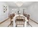 Bright dining room with a large table and sophisticated lighting fixture at 1305 Old Woodbine Rd, Atlanta, GA 30319