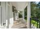 Stunning front porch with stone floor and black railings at 1305 Old Woodbine Rd, Atlanta, GA 30319