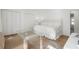 Cozy main bedroom features a neutral color palette, hardwood floors, and double closets for ample storage at 1305 Old Woodbine Rd, Atlanta, GA 30319
