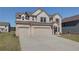 Attractive two-story home with a spacious driveway and a convenient attached two-car garage at 2366 Cadenza Cir, Dacula, GA 30019