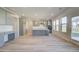 Bright kitchen features modern grey cabinets, white countertops, and stainless steel appliances at 2366 Cadenza Cir, Dacula, GA 30019