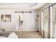 Spacious bedroom with a barn door, natural light, and neutral decor at 4435 Bellwood Cir, Atlanta, GA 30349