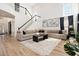 Spacious living room with a large sectional sofa and tall ceilings at 4435 Bellwood Cir, Atlanta, GA 30349