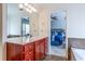 Bathroom with wooden vanity and access to bedroom at 2145 Shoop Se Ct # 3, Smyrna, GA 30080