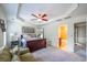 Spacious bedroom featuring a dark wood sleigh bed and an ensuite bathroom at 2145 Shoop Se Ct # 3, Smyrna, GA 30080