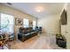 Bonus room featuring a large screen television, a modern sofa, and bright windows at 2145 Shoop Se Ct # 3, Smyrna, GA 30080