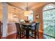 Cozy dining area featuring a modern pendant light fixture and large windows for ample natural light at 2145 Shoop Se Ct # 3, Smyrna, GA 30080