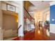 Grand foyer featuring hardwood floors, elegant staircase, and decorative details like crown molding at 2145 Shoop Se Ct # 3, Smyrna, GA 30080
