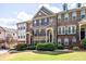 Charming brick townhome with manicured landscaping, a welcoming entrance, and classic architectural details at 2145 Shoop Se Ct # 3, Smyrna, GA 30080