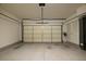 Empty two car garage with white doors, ready to be filled with your cars or storage items at 2145 Shoop Se Ct # 3, Smyrna, GA 30080