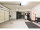 Garage with ample storage space and work-out area; equipment and shelving included at 2145 Shoop Se Ct # 3, Smyrna, GA 30080