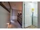 Carpeted hallway leading to a laundry room with a white washer and dryer at 2145 Shoop Se Ct # 3, Smyrna, GA 30080
