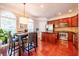 Open kitchen with stainless steel appliances, granite countertops, a center island, and natural lighting at 2145 Shoop Se Ct # 3, Smyrna, GA 30080