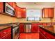 Stylish kitchen with granite countertops, stainless steel appliances, and ample cabinet space at 2145 Shoop Se Ct # 3, Smyrna, GA 30080