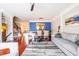 Inviting living room with hardwood floors, stylish furnishings, and an open layout to the dining area at 2145 Shoop Se Ct # 3, Smyrna, GA 30080