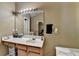 Bathroom with large mirror and vanity with drawers below at 2477 Lakebrooke Dr, Marietta, GA 30066