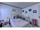 Bright bedroom featuring a comfy bed, desk area, and natural light at 2477 Lakebrooke Dr, Marietta, GA 30066