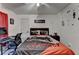 This bedroom is equipped with a desk and decorated with gaming accessories at 2477 Lakebrooke Dr, Marietta, GA 30066