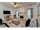 Bright living room with fireplace, hardwood floors and lots of natural light at 2477 Lakebrooke Dr, Marietta, GA 30066