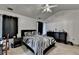 Spacious main bedroom with high ceilings and black-and-white bedding and decor at 2477 Lakebrooke Dr, Marietta, GA 30066