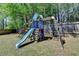 Backyard playground for featuring swings, a slide, and climbing ladder at 2477 Lakebrooke Dr, Marietta, GA 30066