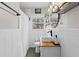Charming bathroom with a vessel sink, stylish lighting, and tiled walls at 542 Goldsboro Ne Rd # C, Atlanta, GA 30307
