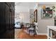 Inviting entryway with hardwood floors, dining set, and view into living space at 542 Goldsboro Ne Rd # C, Atlanta, GA 30307