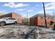 Parking lot with a car parked, with buildings in the background at 542 Goldsboro Ne Rd # C, Atlanta, GA 30307