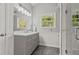 Bathroom with a modern vanity and a large window at 1222 W Wylie Bridge Rd, Woodstock, GA 30188