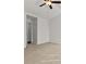 Bedroom features carpet and ceiling fan at 1222 W Wylie Bridge Rd, Woodstock, GA 30188