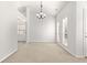 Open dining room with lots of light from multiple windows at 1222 W Wylie Bridge Rd, Woodstock, GA 30188