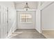 Cozy dining area with wood floors and natural light from a window at 1222 W Wylie Bridge Rd, Woodstock, GA 30188