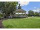 Picturesque gazebo on a grassy lawn, perfect for outdoor events and gatherings at 1222 W Wylie Bridge Rd, Woodstock, GA 30188