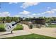 Outdoor venue featuring guitar statue, walking path, brick walls, and covered stage at 1222 W Wylie Bridge Rd, Woodstock, GA 30188