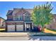Beautiful two-story brick home with a well-manicured lawn and a two-car garage at 2269 Reddy Farm Ln, Grayson, GA 30017