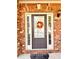 Charming front door with sidelights and a seasonal wreath for a welcoming curb appeal at 2269 Reddy Farm Ln, Grayson, GA 30017