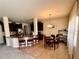 Open-concept kitchen with breakfast bar, stainless steel appliances, and dark wood cabinets at 2269 Reddy Farm Ln, Grayson, GA 30017