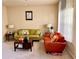 Inviting living room with a cozy seating arrangement and neutral wall color at 2269 Reddy Farm Ln, Grayson, GA 30017
